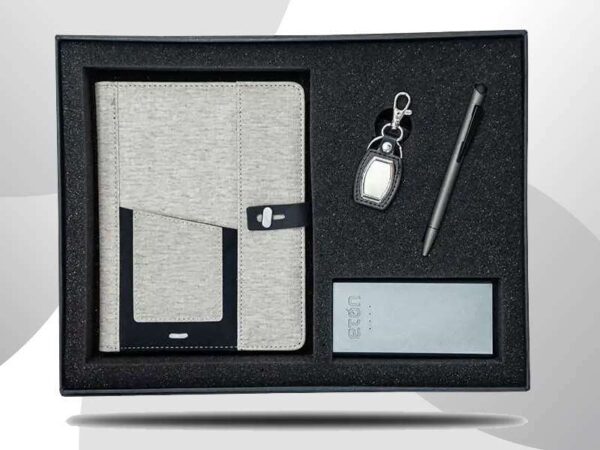 Bevogue corporate gift set with a 8400 mah powerbank leather keychain and metal pen in dubai