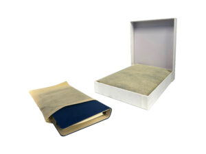 Closed and open white book boxes with covers.