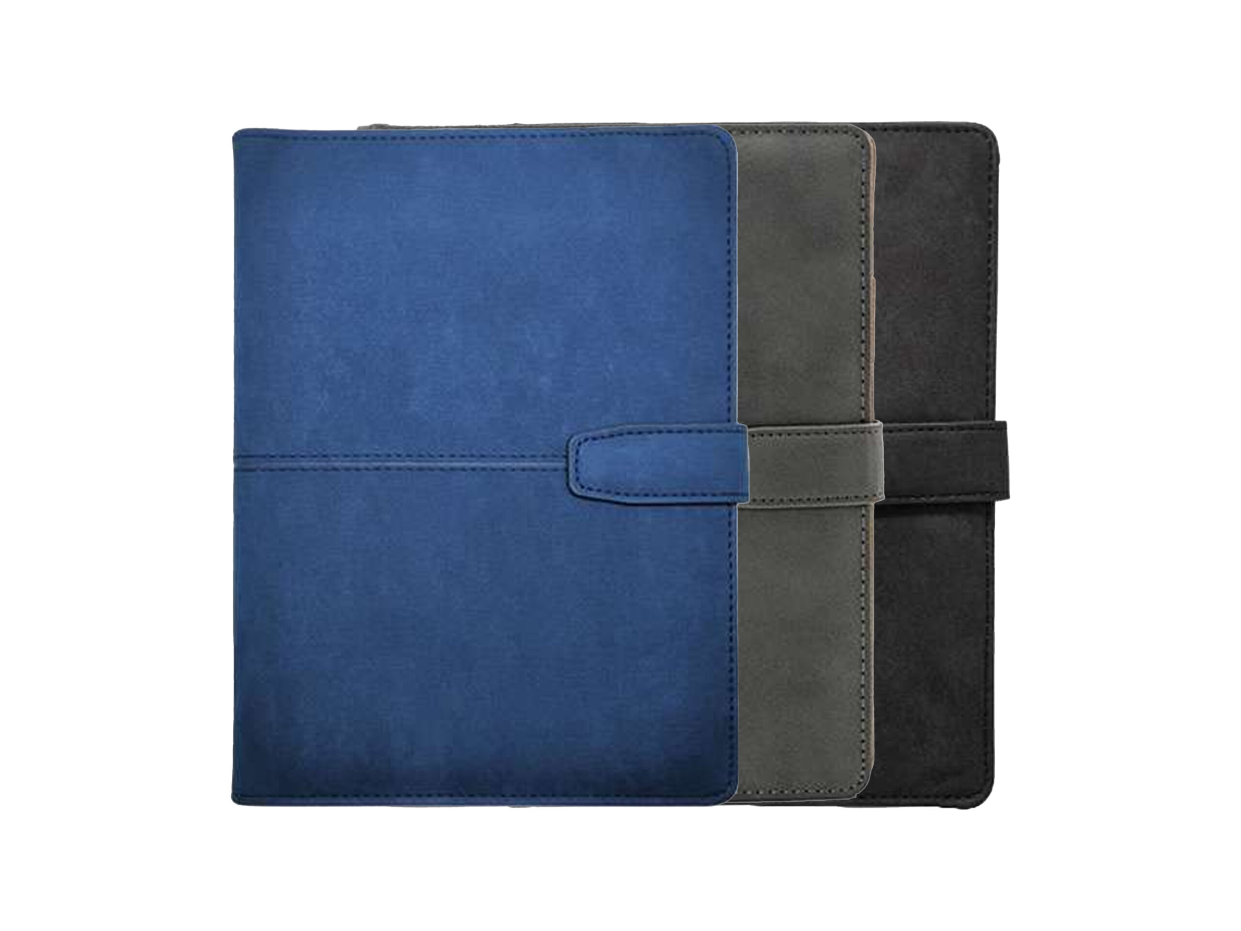 Three colored leather planners stacked together