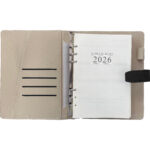 Open 2026 business diary with beige cover.