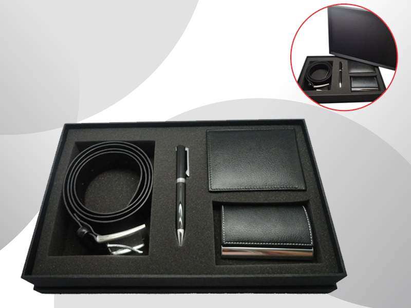Luxury gift set with wallet, belt, and pen