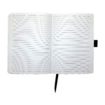 Open lined notebook with bookmark.