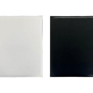 White and black leathern notebooks side by side