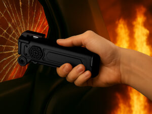 Emergency tool shattering car window in fire.