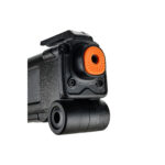 Close-up of toy gun barrel with orange tip