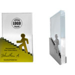 Award plaque with steps and silhouette figure.