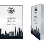 Personalized award plaque with skyscraper design.