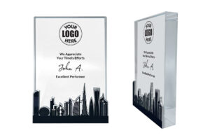 Personalized award plaque with skyscraper design.
