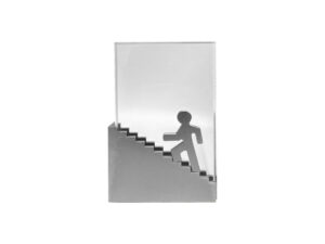 Metal figure climbing stairs trophy