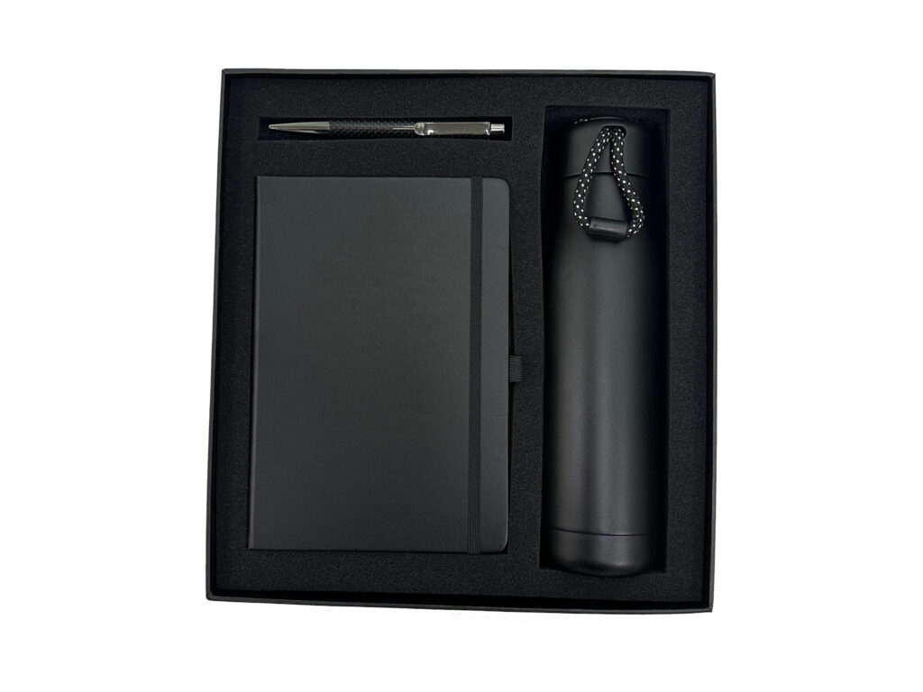 Black notebook, pen, and bottle gift set in box.