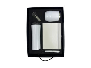 Gift set with tumbler, notebook, pen, keychain.