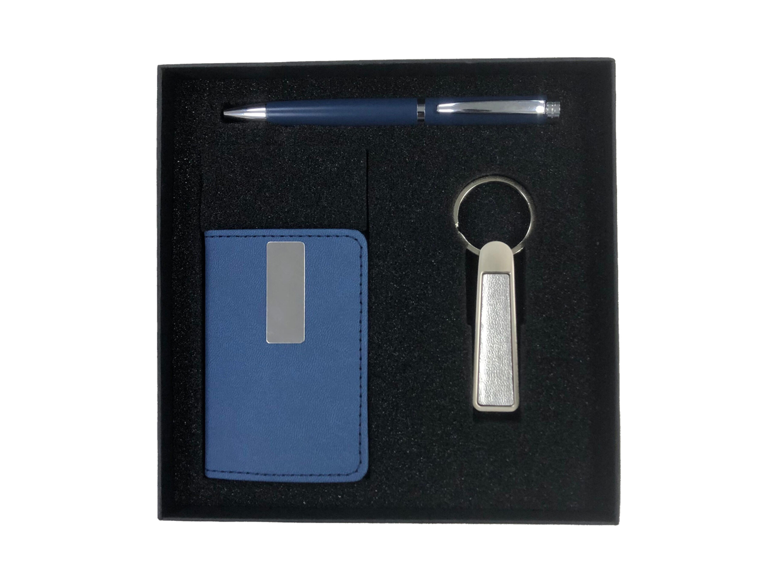 Gift set with pen, wallet, keychain.