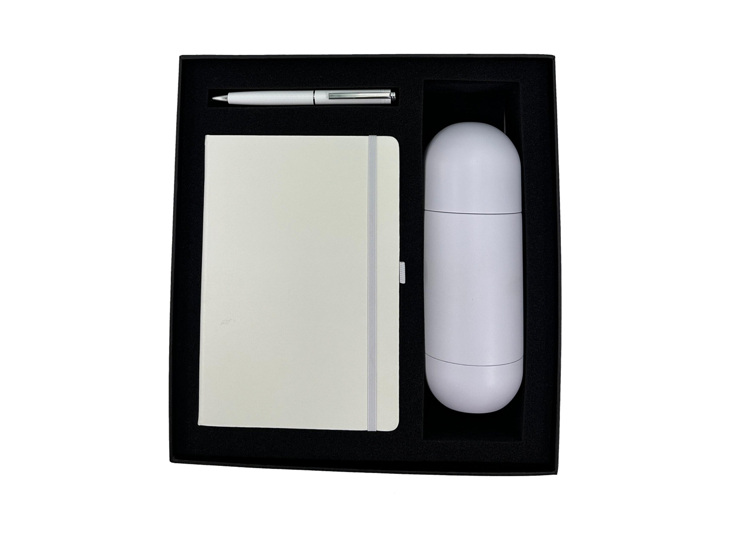 Gift set with pen, notebook, and tumbler.