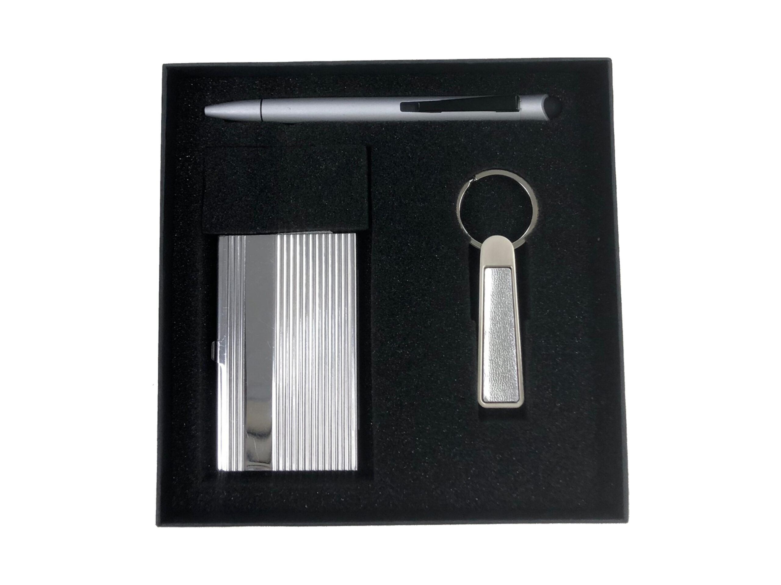 Black gift set with pen, card holder, keychain.