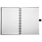 Open spiral notebook with lined pages.