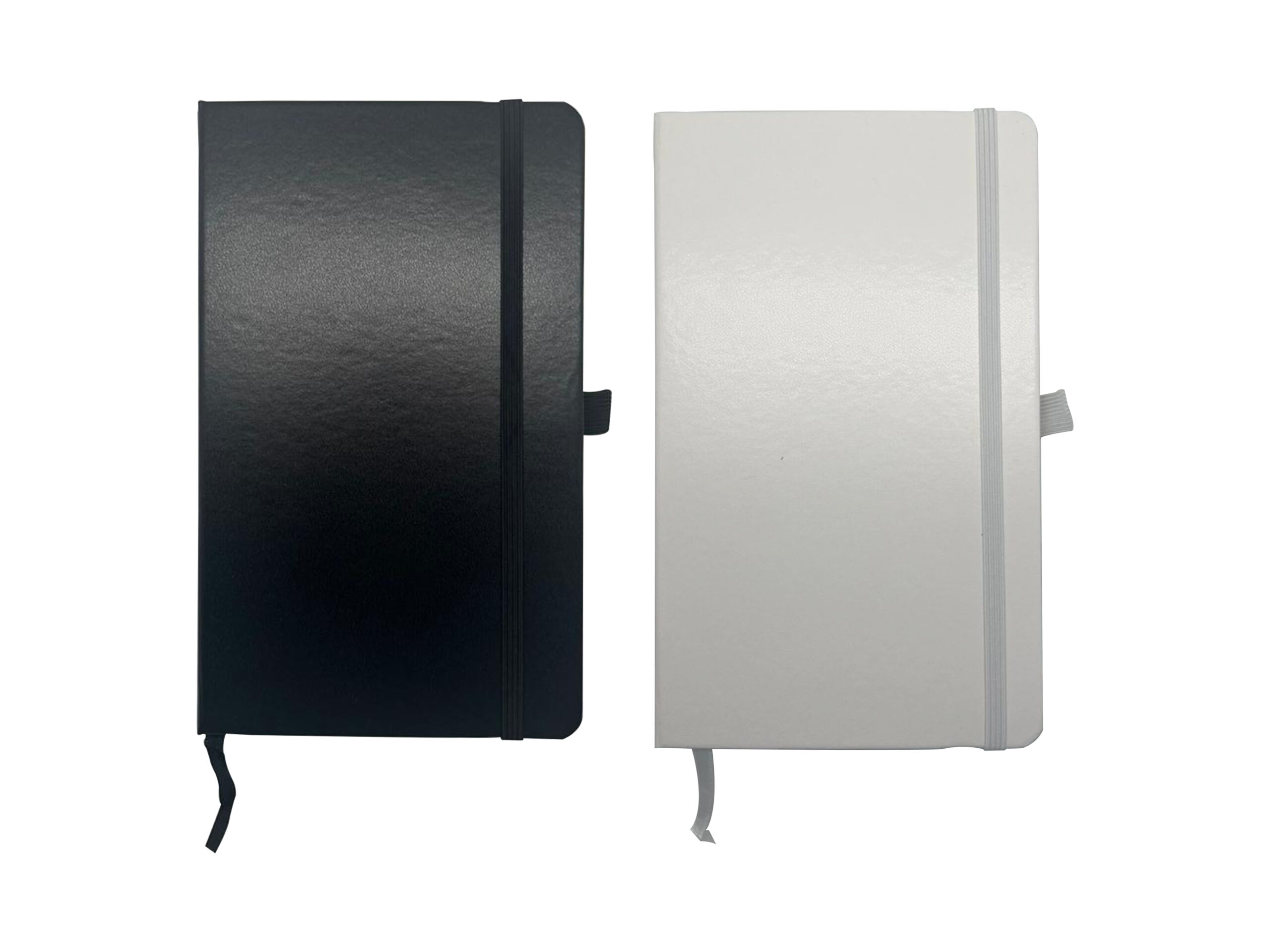 Black and white closed notebooks with elastic bands