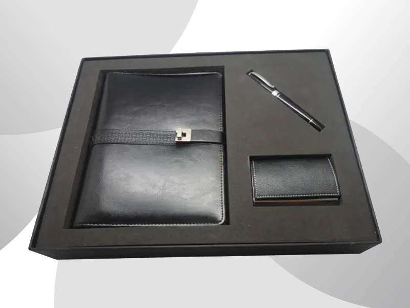 Black leather business gift set: notebook, pen, card holder.