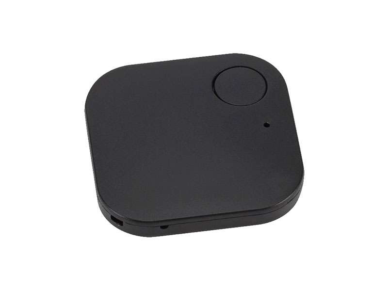 Black Bluetooth tracker device with button.
