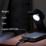 Modern desk lamp with brightness settings and power button.