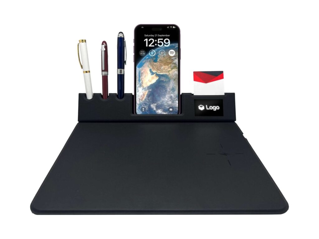 Wireless charging desk mat with phone and pens