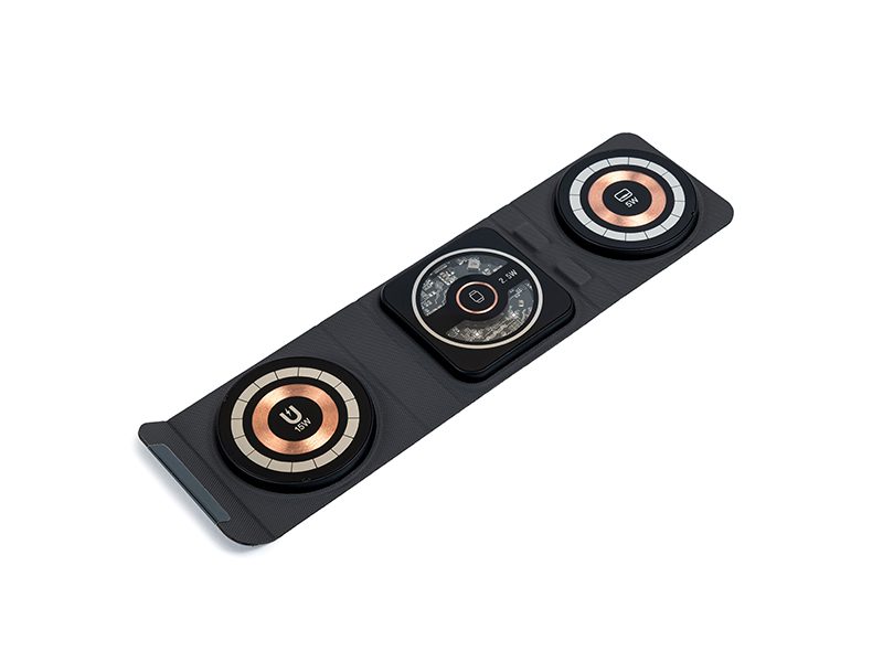 Portable wireless charging pad for multiple devices.