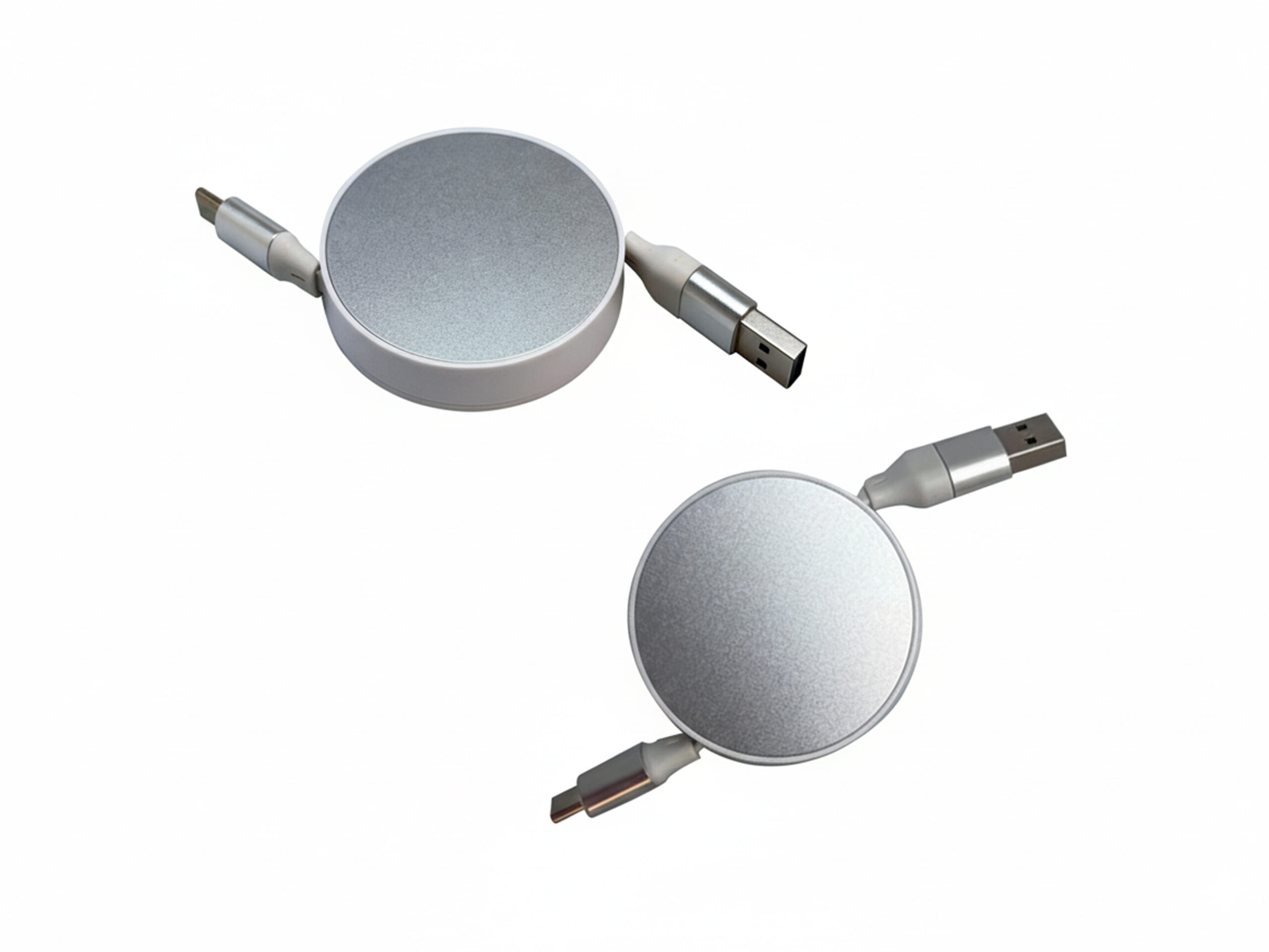 Retractable USB charging cables in white and silver.