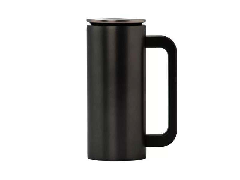 Black coffee mug with handle on the side.