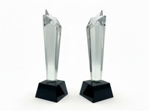 Two star-shaped silver trophies on display