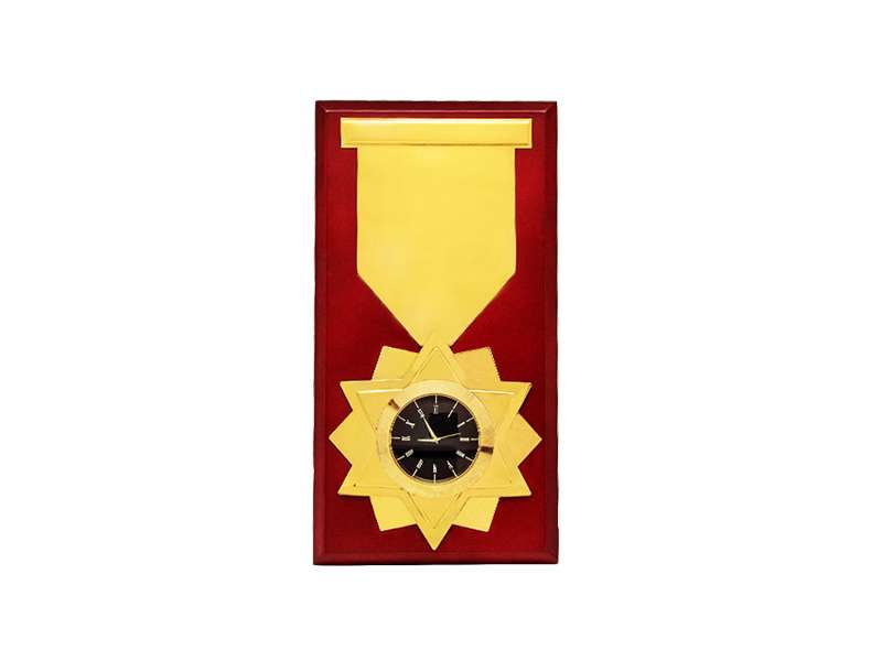 Gold star clock award in red frame.