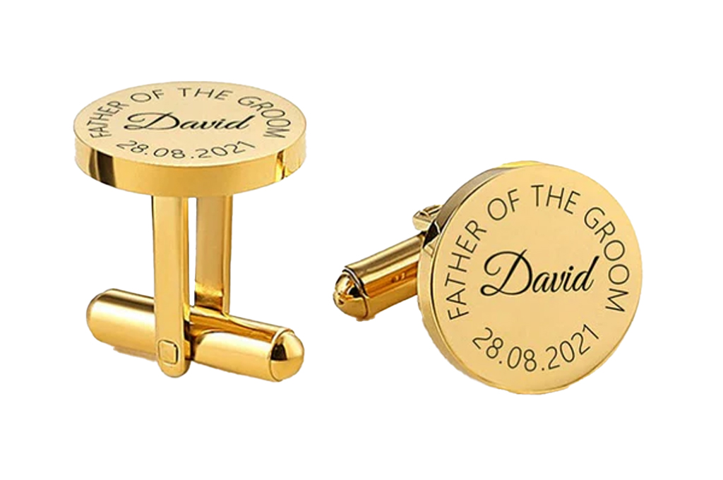 Gold cufflinks engraved 'Father of the Groom.'
